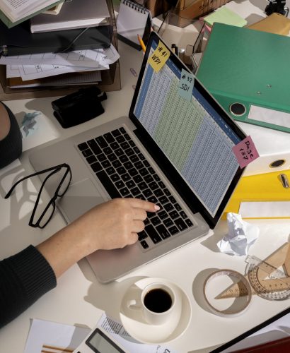 view-messy-office-workspace-with-laptop